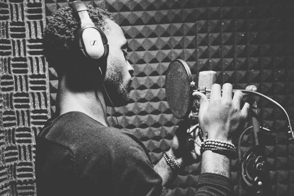 vocalist in studio with a microphone