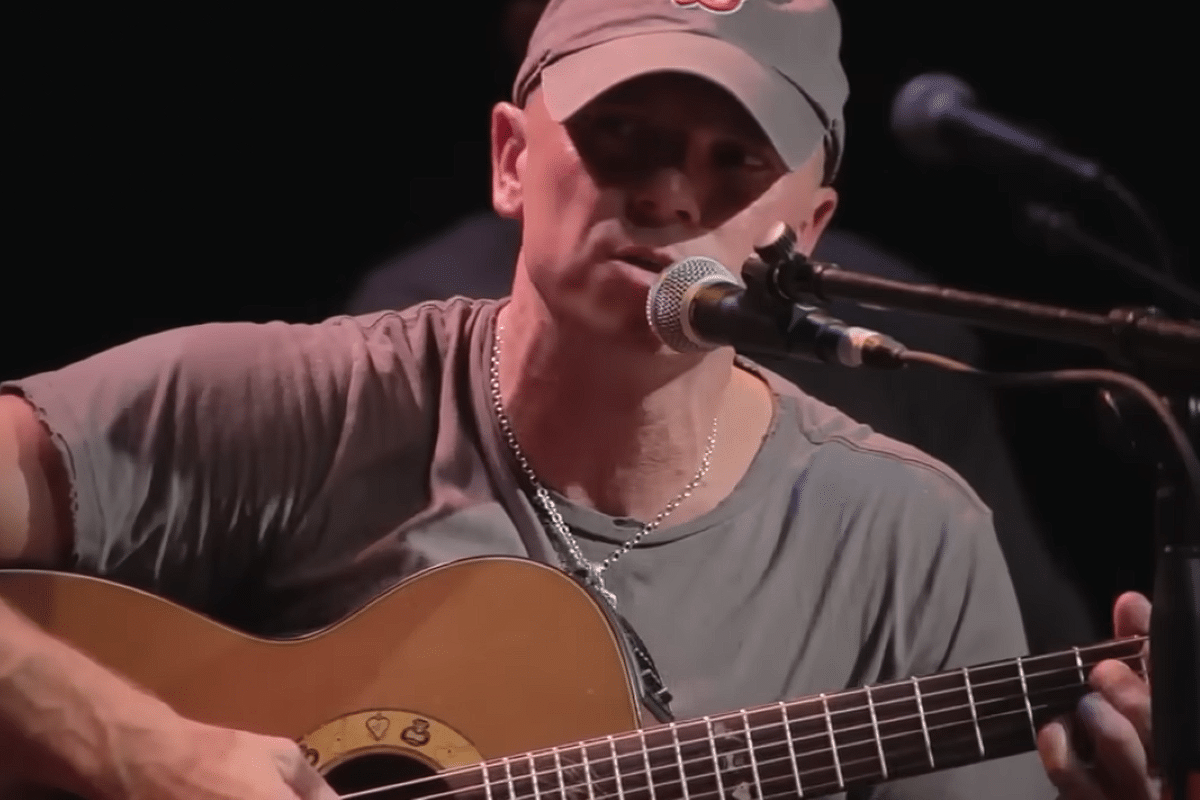 kenny chesney singing and playing guitar