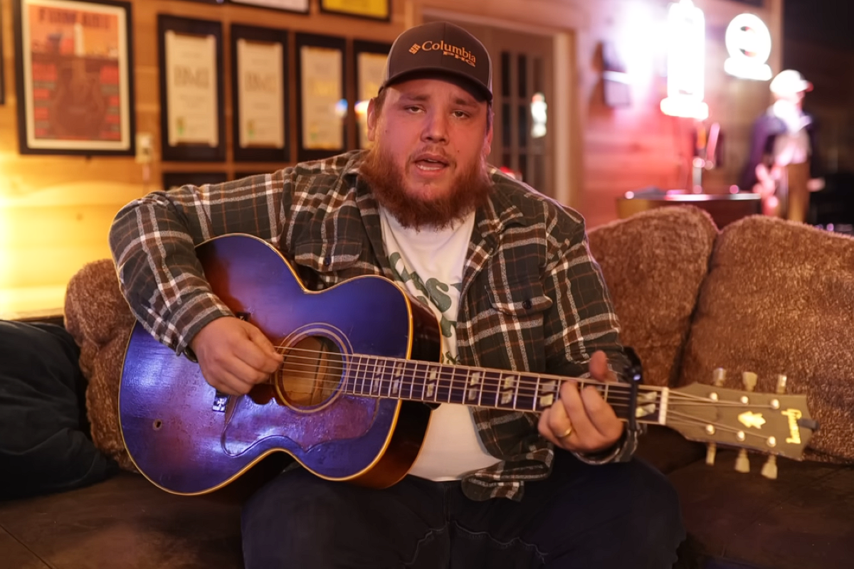 Luke Combs Singing and Playing guitar