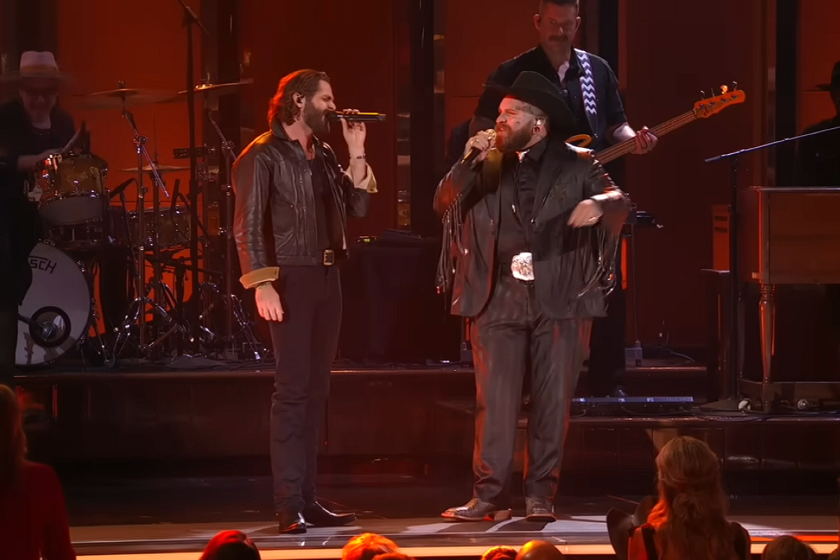 Teddy Swims and Thomas Rhett on stage at the 2024 CMA awards