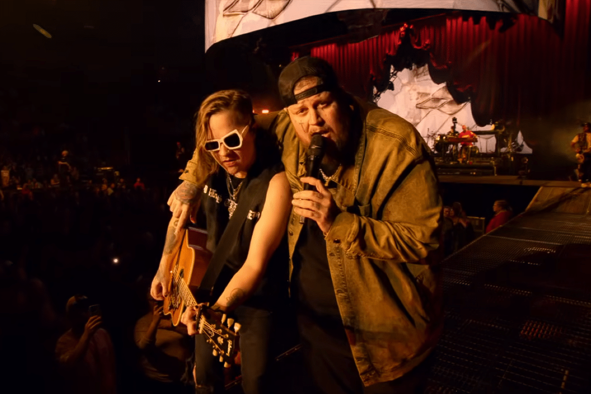 jelly roll and guitarist performing on stage