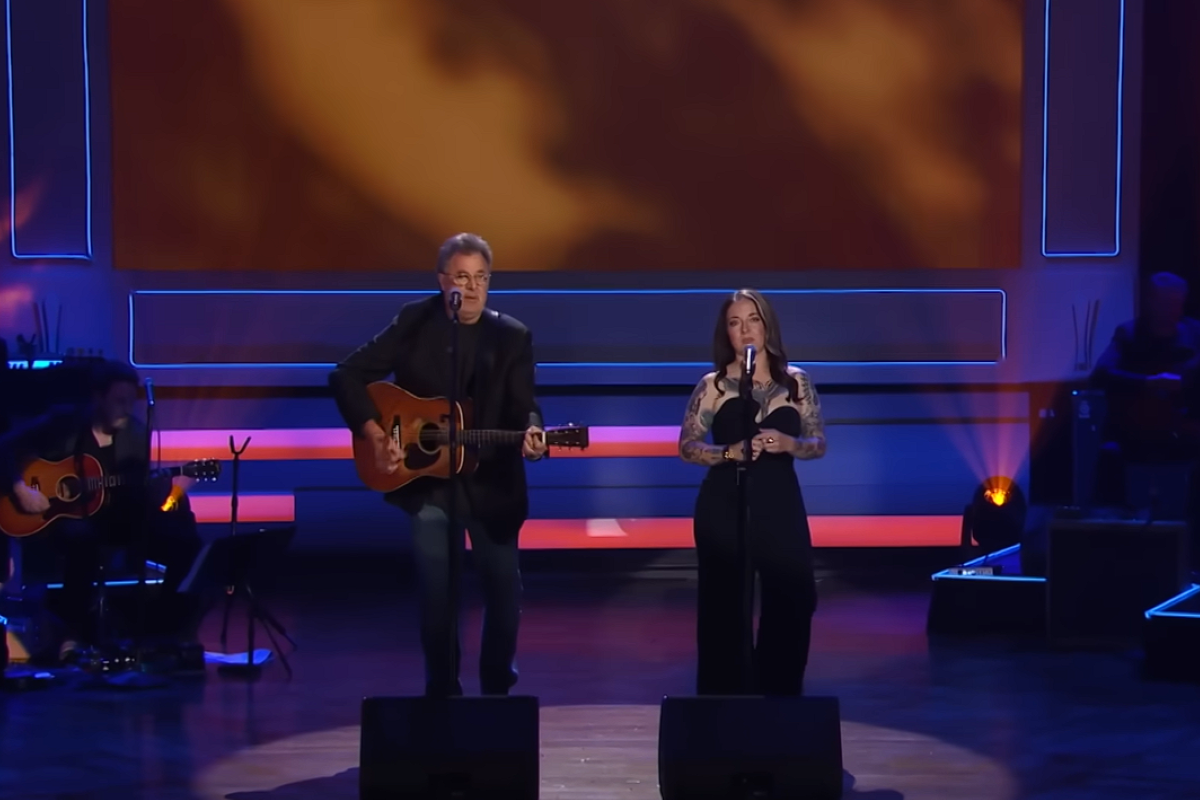 vince gill and ashley mcbryde performing on stage together