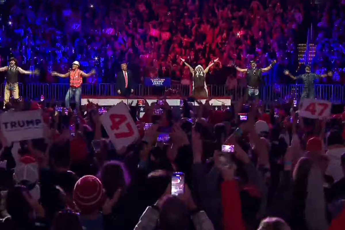 Village people on stage with Trump