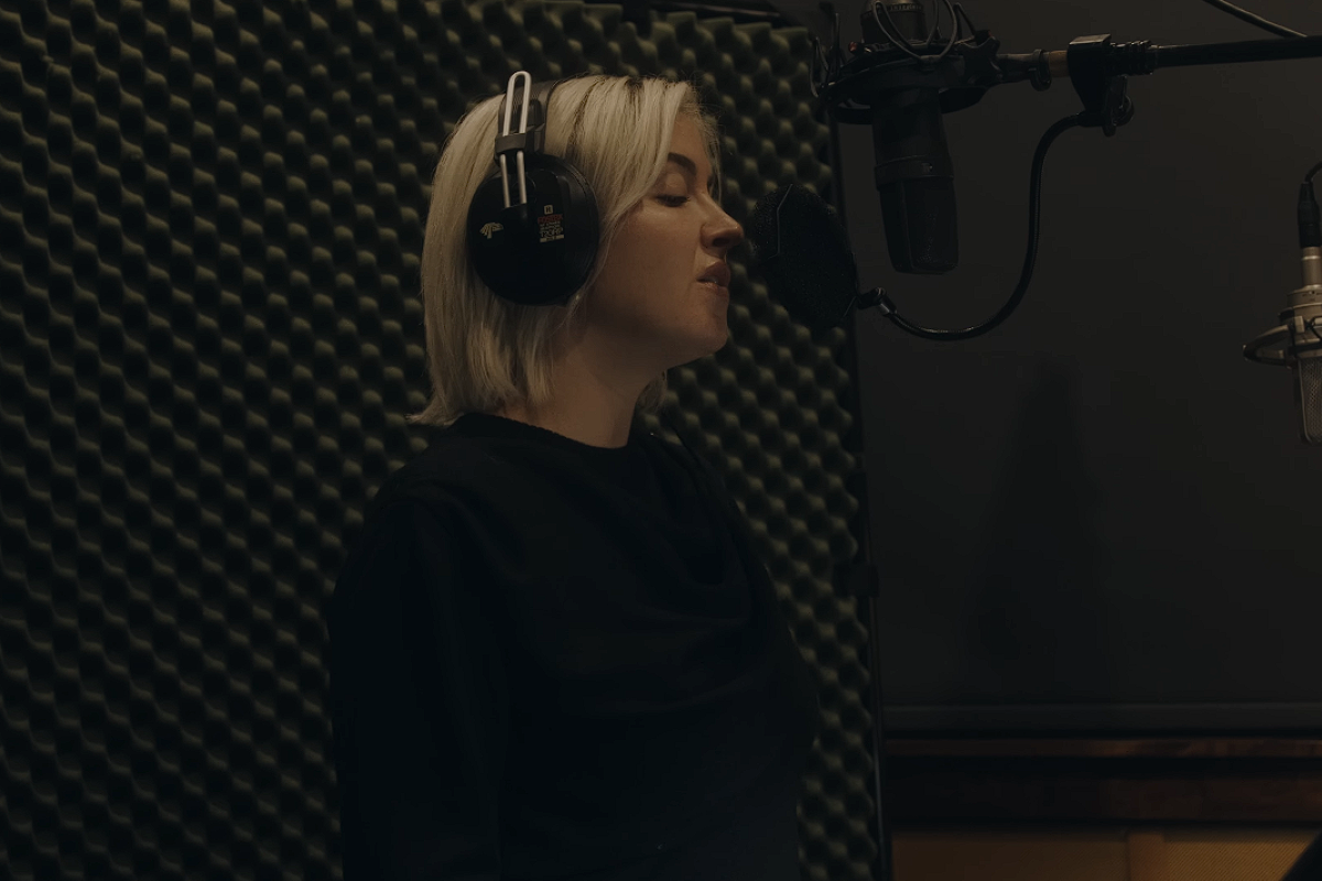 Maggie Rose singing in the studio