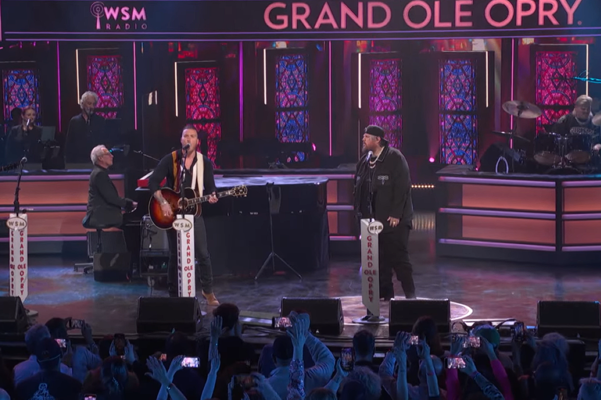 Jelly Roll and Brandon Lake performing at the Grand Ole Opry