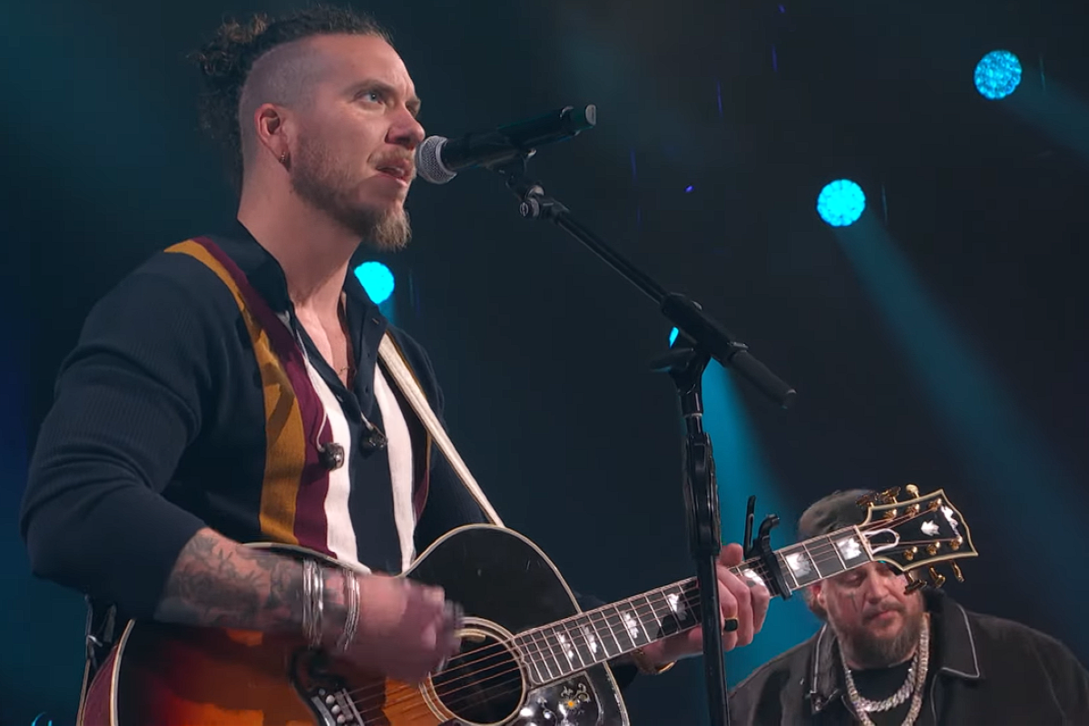 Jelly Roll and Brandon Lake performing at the Grand Ole Opry