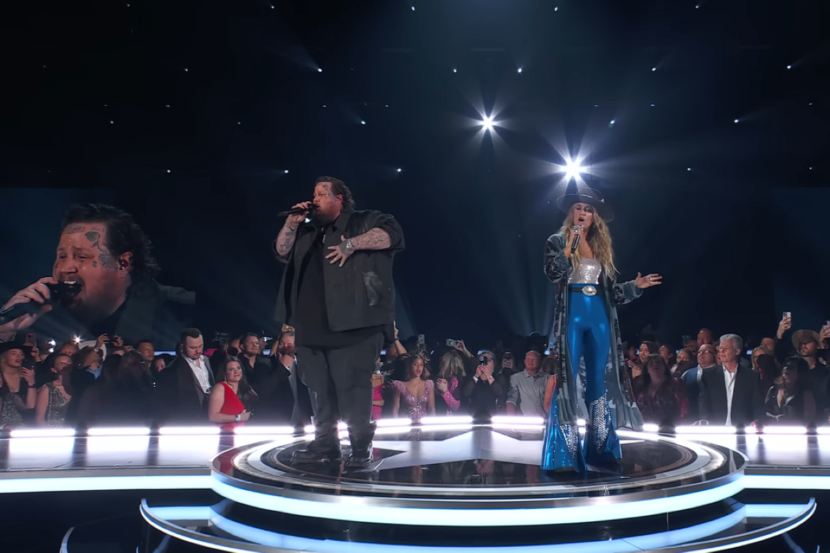 Jelly Roll and Lainey Wilson singing at the 58th ACM Awards