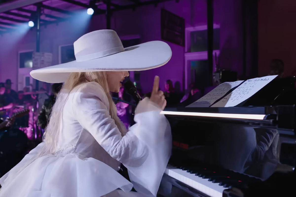 Lady Gaga singing and playing piano