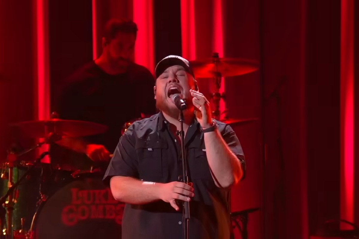 Luke Combs performing at the CMA awards