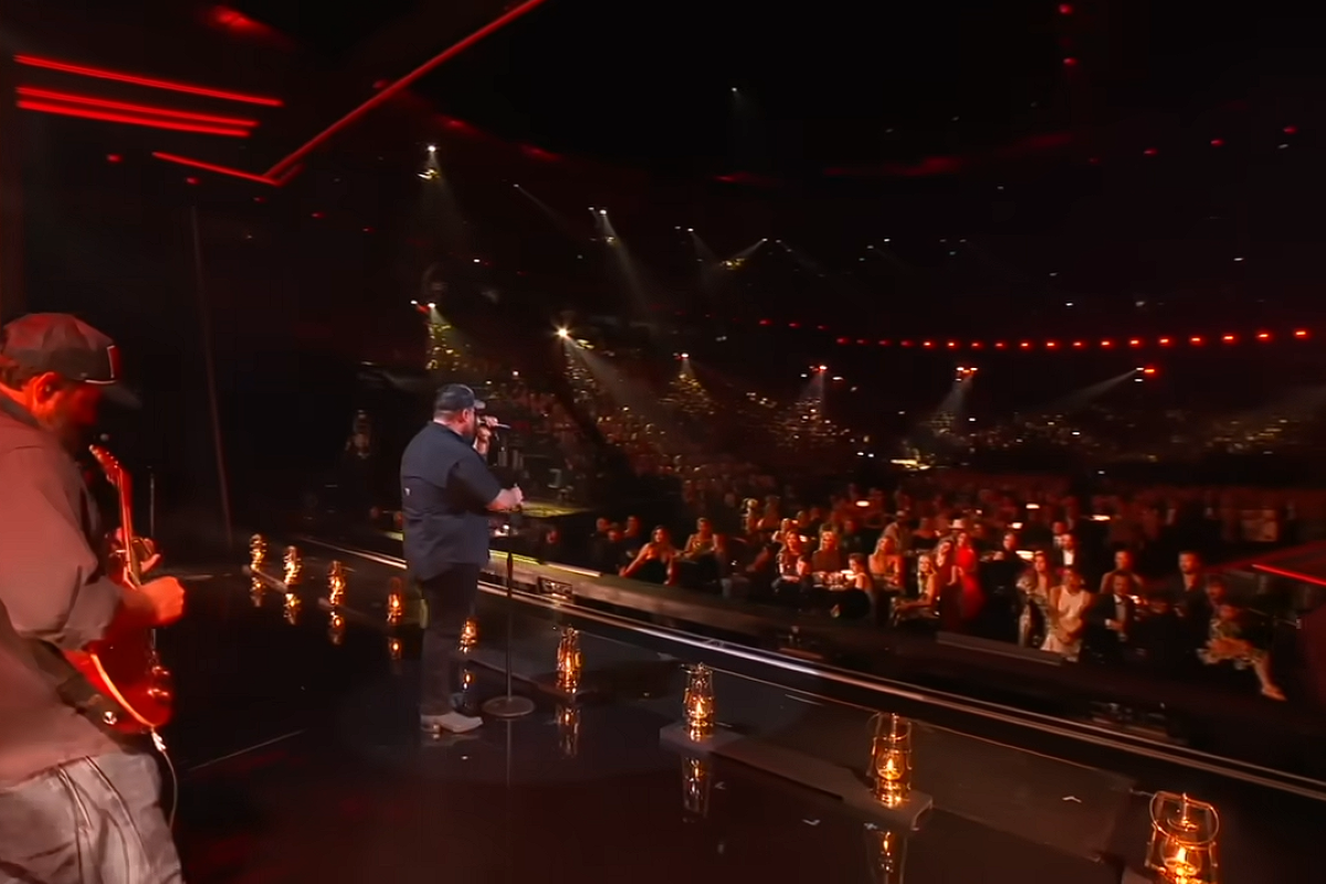 Luke Combs on stage at the CMA awards